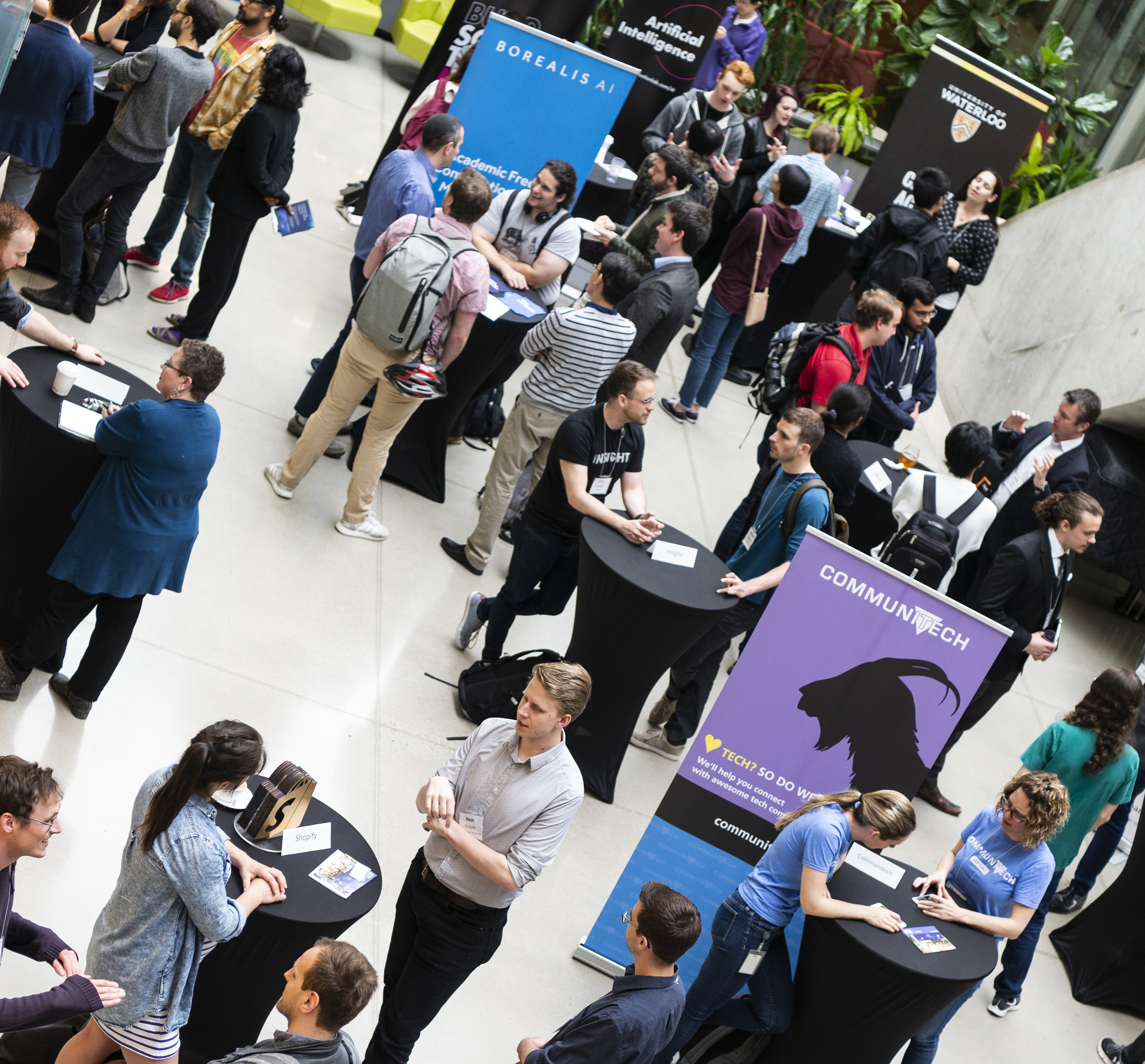 Aerial shot of people at a networking session in an atrium