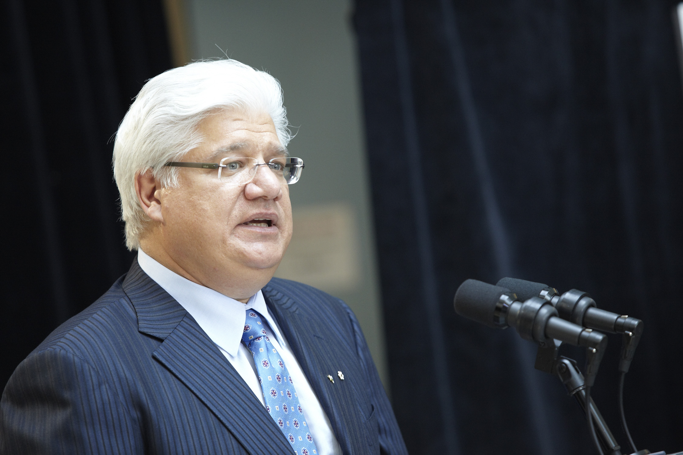 Mike Lazaridis speaking at the Global Outreach Investment announcement with Prime Minister Stephen Harper
