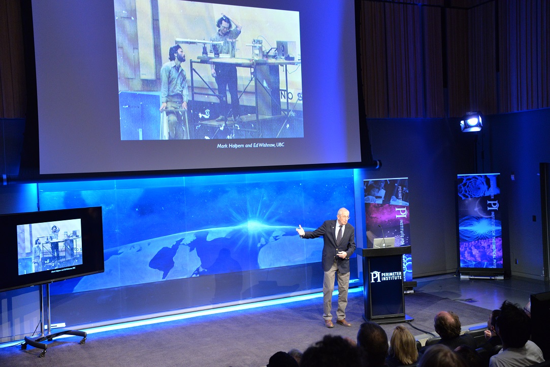Jim Peebles speaking in the main auditorium in front of a large audience at the launch of the Centre for the Universe. 