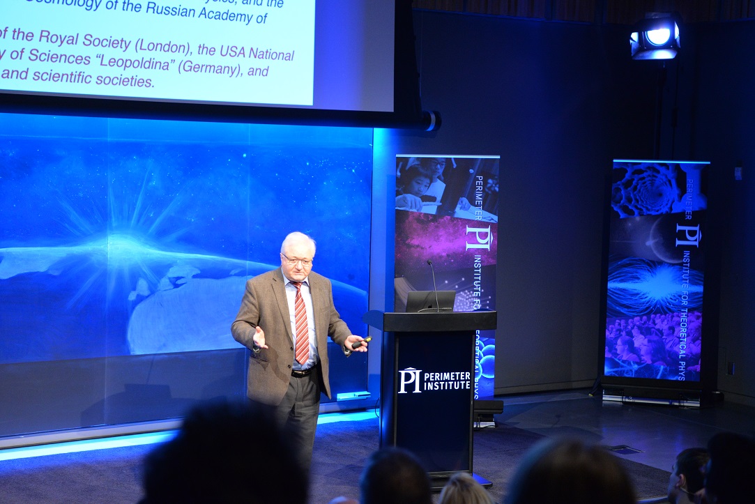 Rashid Sunyaev speaking in the main auditorium in front of a large audience at the launch of the Center for the Universe about the life and work of the late Yakov Zel’dovich, the namesake of a new fellowship. 