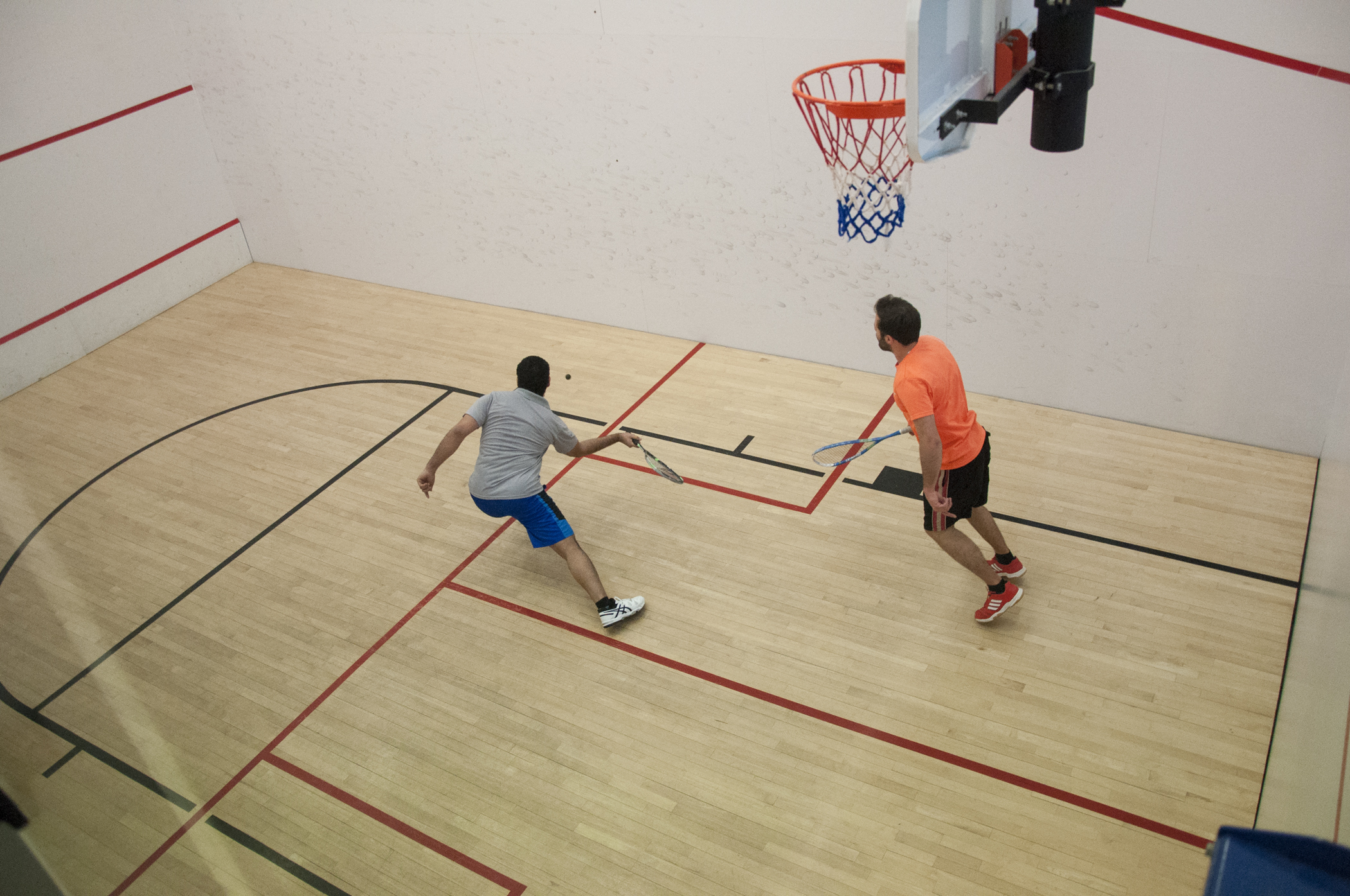 researchers playing squash at Perimeter Institute