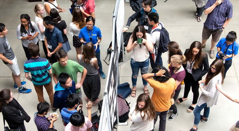 Aerial shot of a group of students in an atrium