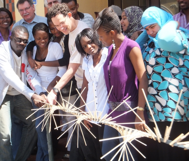 Neil Turok with people in Africa