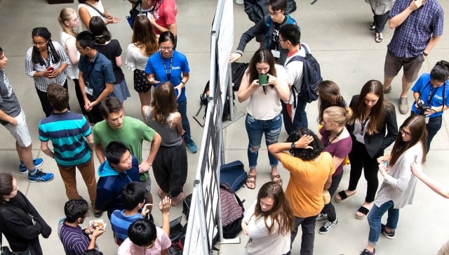 Aerial shot of a group of students in an atrium