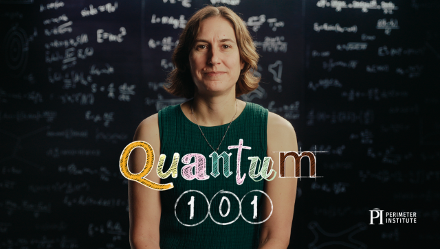 Video still of woman in a green shirt sitting in front of a blackboard with equations and the words Quantum 101 in front