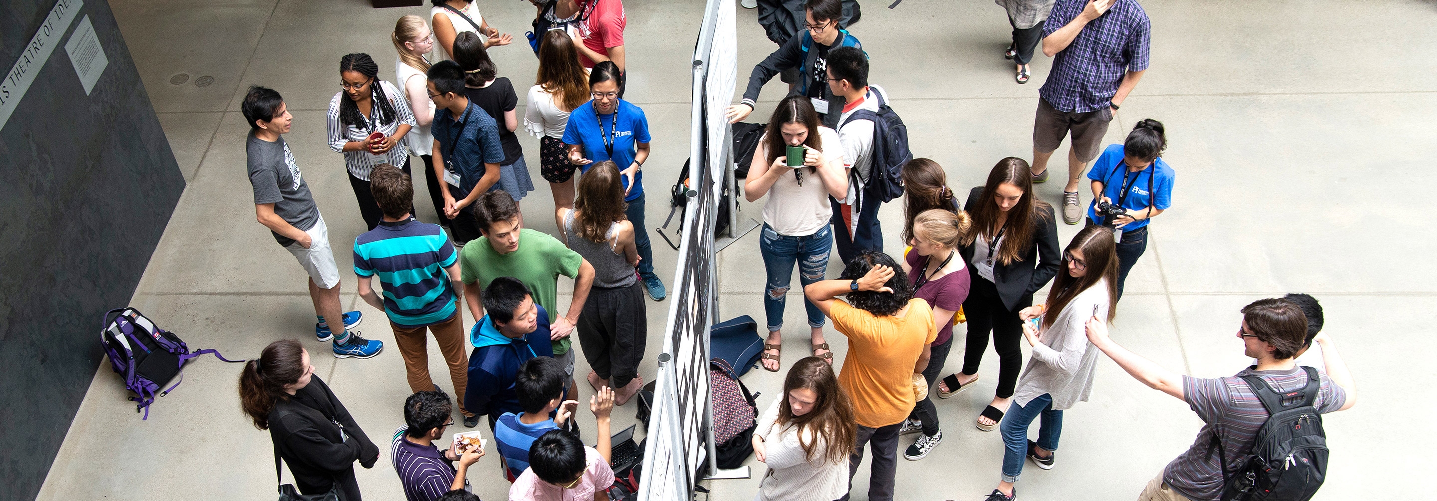Aerial shot of a group of students in an atrium