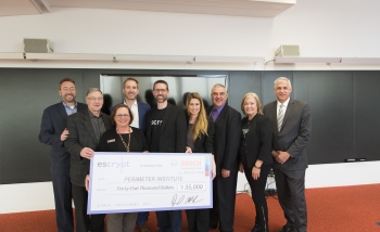Perimeter's team holding a cheque from Bosch of 35.000 dollars