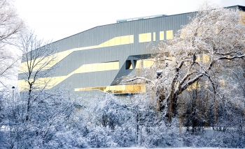 Perimeter Institute building golden ribbons facade in the winter with snow