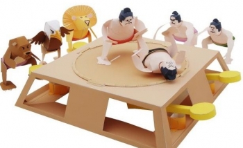 Paper sumo figurines illustrating the quantum battle