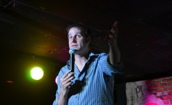 Man speaking on stage 