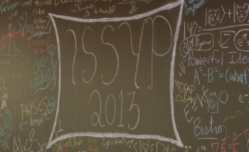 Issyp writing on chalkboard